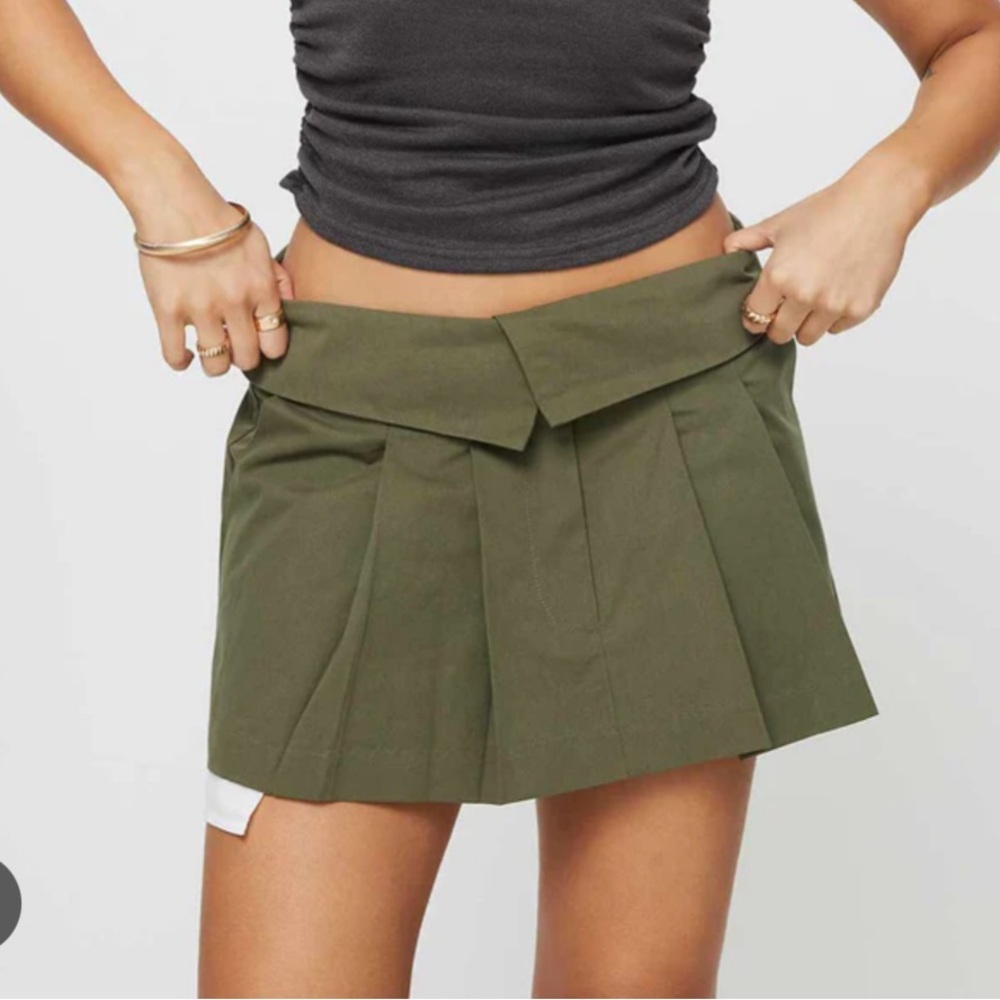Olive green lioness exposed pockets flap flip over hem mini skirt